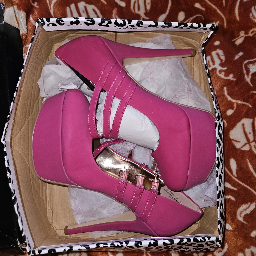 Pink strapped pumps